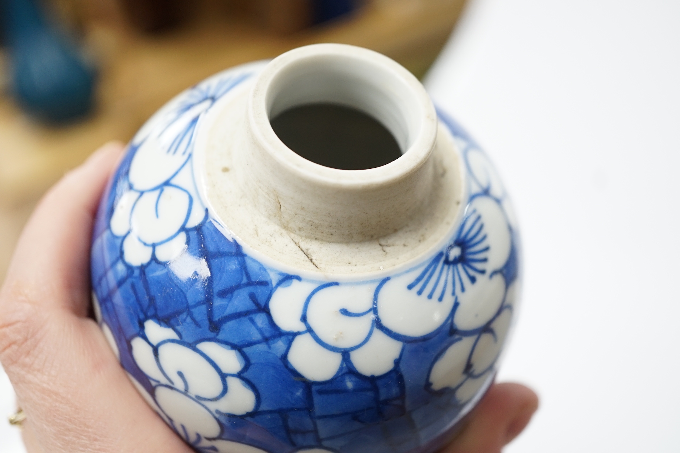 A Chinese Kangxi blue and white ‘prunus’ ovoid jar, 11cm